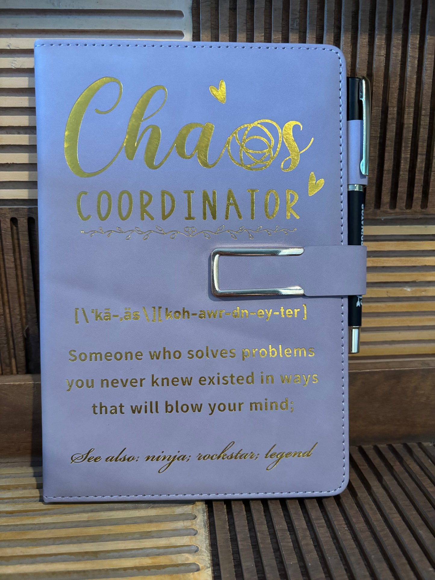 Boho-inspired Chaos Coordinator journal and pen set with metallic lettering, designed for spiritual and creative women managing daily life with style