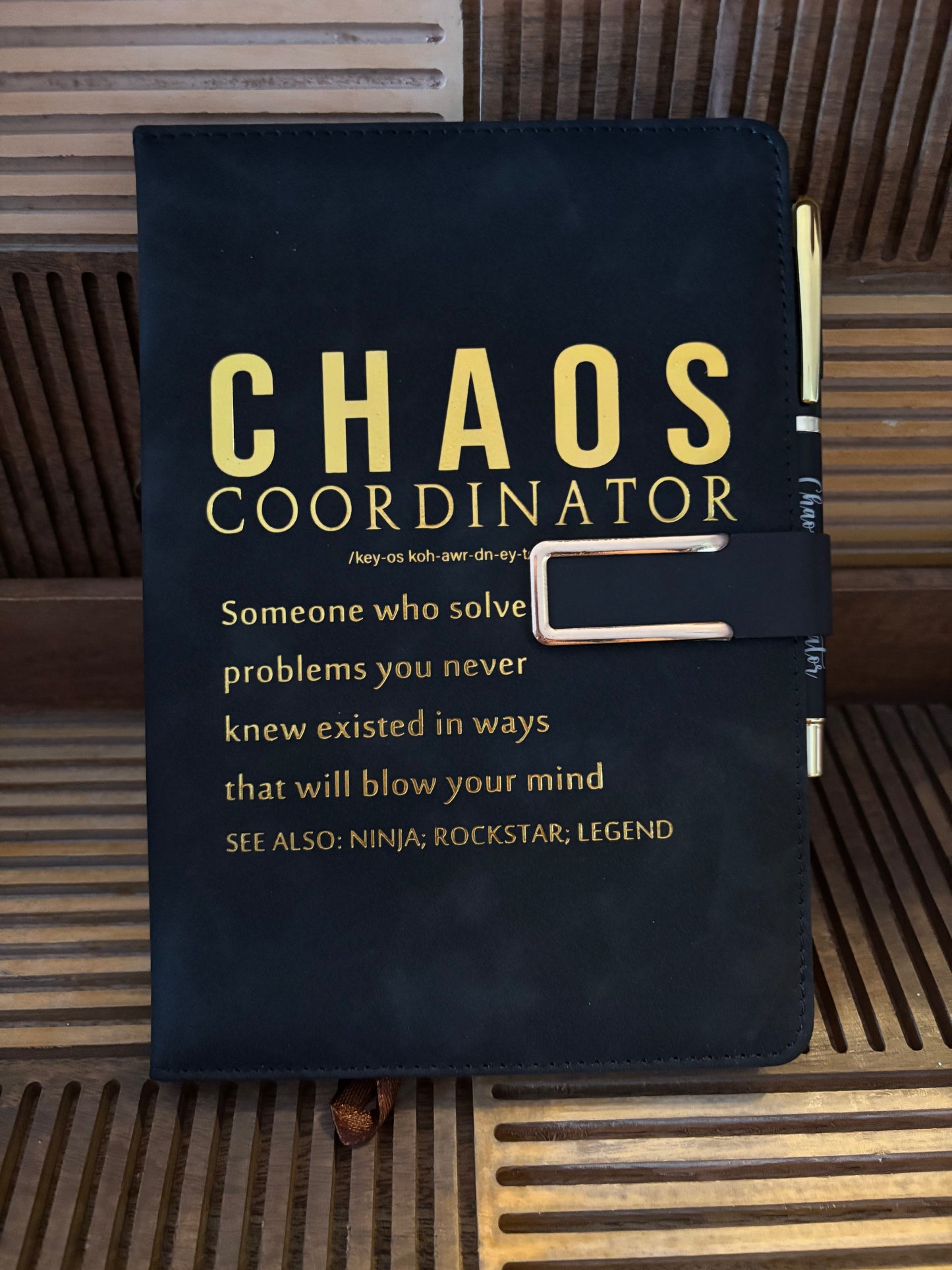Boho-inspired Chaos Coordinator journal and pen set with metallic lettering, designed for spiritual and creative women managing daily life with style