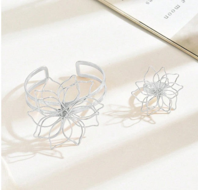 Floral wire design bracelet and ring set for women”
“Lightweight boho floral jewelry set with openwork wire design”
“Nature-inspired blooming grace jewelry set, bracelet and ring”
“Creative European and American style floral wire jewelry set”