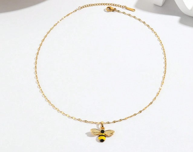 “Delicate gold bee pendant necklace for women, daily wear jewelry”
“Minimalist bee charm necklace from Christie Bella Bee Loved Collection”
“Adjustable gold-tone necklace with bee pendant”
“Nature-inspired dainty necklace with symbolic bee charm”