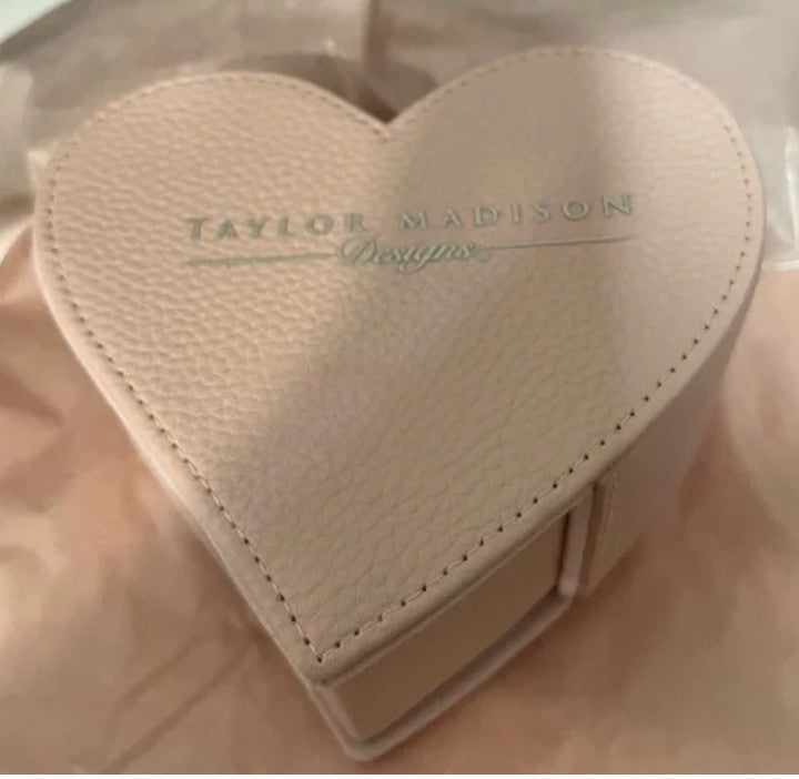 Taylor Madison heart-shaped leather jewelry box"
“Heart jewelry case with plush interior for rings and earrings”
“Elegant travel-sized jewelry organizer in leather finish”
“Romantic keepsake box for gifts and personal storage”