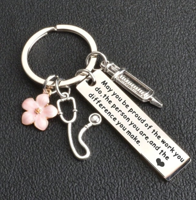 “Stainless steel inspirational nurse keychain with syringe and flower charms”
“Engraved nurse quote keychain for medical professionals”
“Inspirational gift keyring for nurse appreciation and graduation”
“Nurse charm keychain with medical and floral accents”