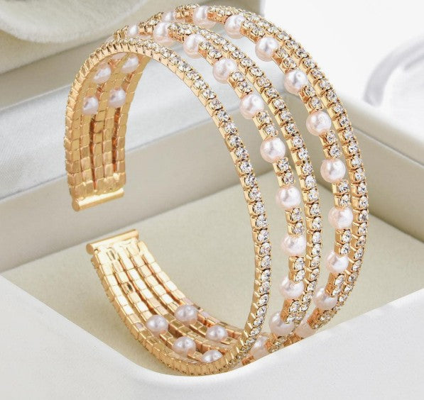 “5-tiered pearl and rhinestone bridal cuff bracelet”

“Elegant open bangle bracelet with pearls and sparkle”

“Minimalist bridal bracelet with faux pearls and rhinestones”

“Wedding day cuff for brides and spiritual elegance”