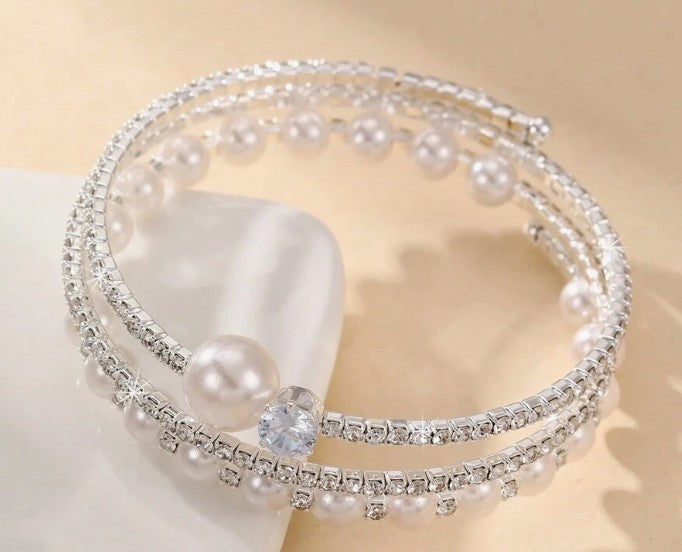 “Dainty silver bangle bracelet with faux pearls and rhinestones”

“Elegant minimalist bracelet for weddings or daily wear”

“Lightweight silver-tone bracelet with pearl and sparkle accents”

“Subtle glam wedding bracelet with rhinestone detail”

