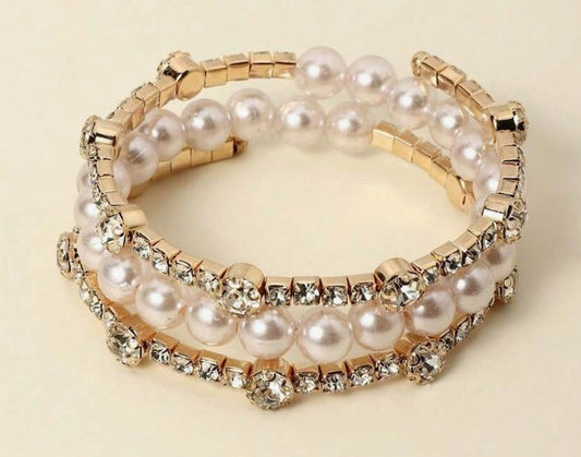 “Elegant gold bangle bracelet with rhinestones and faux pearls”

“Gold-tone bracelet for weddings and daily wear”

“Luxury bangle with pearl and rhinestone accents in gold finish”

“Chic gold bridal bracelet with minimalist design”
