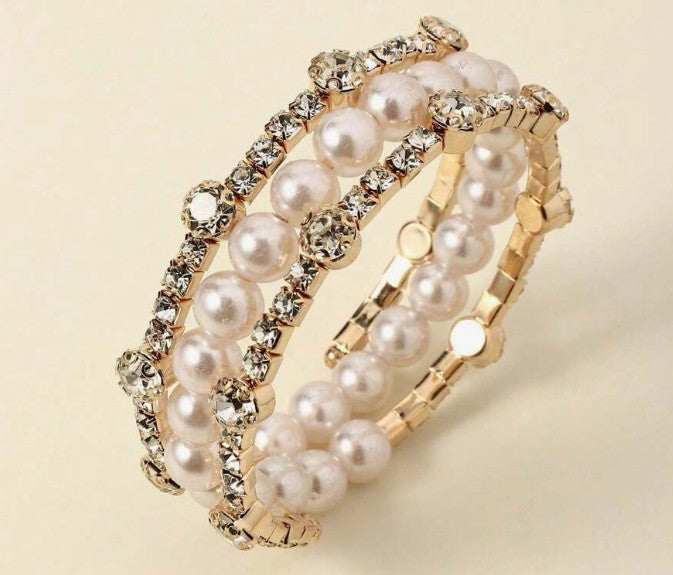 “Elegant gold bangle bracelet with rhinestones and faux pearls”

“Gold-tone bracelet for weddings and daily wear”

“Luxury bangle with pearl and rhinestone accents in gold finish”

“Chic gold bridal bracelet with minimalist design”