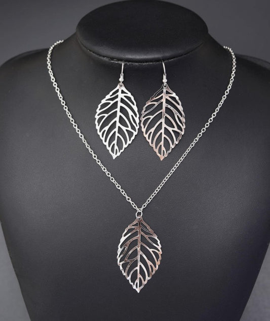 “Silver 3-piece jewelry set with leaf pendant necklace and earrings”

“Delicate silver leaf necklace and matching earrings set”

“Nature-inspired silver jewelry set for spiritual women”

“Lightweight silver leaf design necklace and earring gift set”

