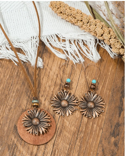 “Boho vintage jewelry set with sunflower pendant and asymmetrical earrings”

“Geometric circle dangle earrings and sunflower necklace in boho style”

“3-piece vintage style jewelry set for women’s daily and festival wear”

“Sunflower and geometric pendant jewelry set with artistic bohemian design”