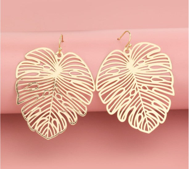 “Gold hollow out leaf drop earrings for women”

“Lightweight boho gold leaf earrings with hollow design”

“Nature-inspired spiritual leaf earrings in gold finish”

“Golden leaf-shaped drop earrings, bohemian style”

