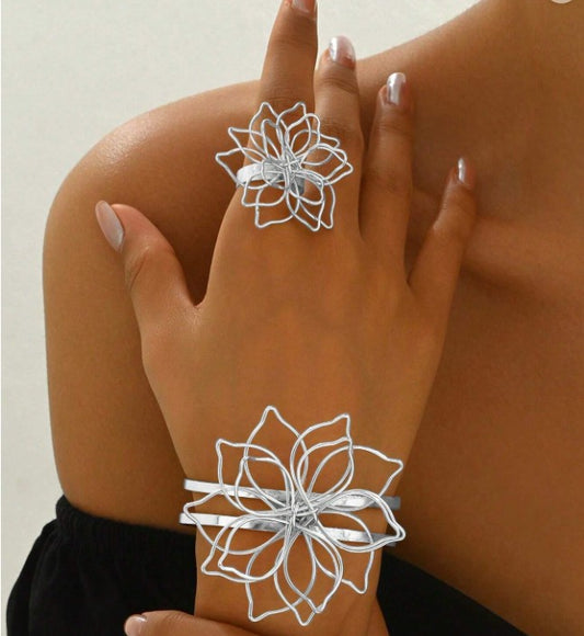 Floral wire design bracelet and ring set for women”

“Lightweight boho floral jewelry set with openwork wire design”

“Nature-inspired blooming grace jewelry set, bracelet and ring”

“Creative European and American style floral wire jewelry set”

