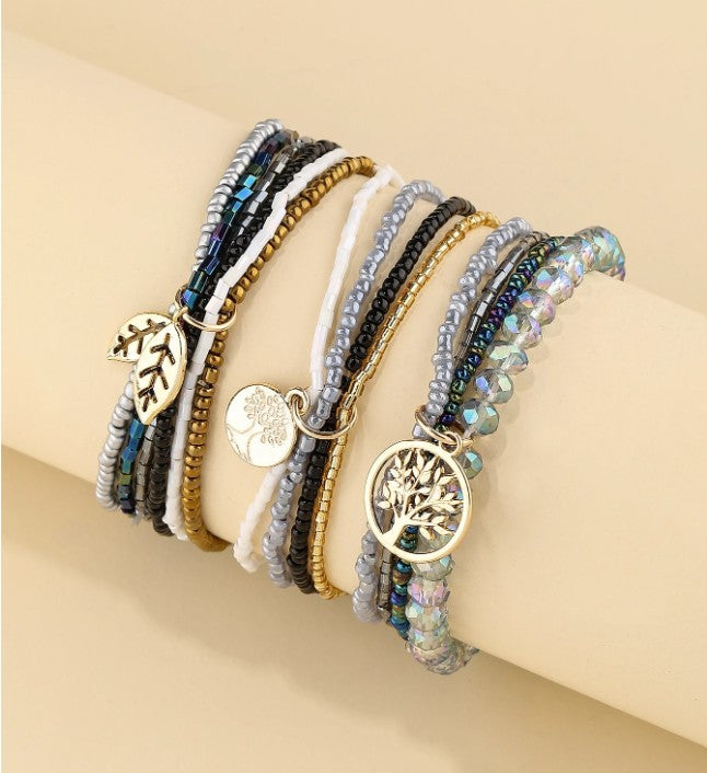 “Bohemian 3pcs beaded bracelet set with tree of life and leaf charms”

“Layered nature-inspired stretch bracelets for yoga, meditation, and daily wear”

“Spiritual beaded bracelet set with tree of life symbolism for women”

“Boho chic bracelet set with earthy charm accents and natural beads”

