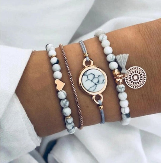 “4pcs tassel decor rhinestone bracelet set in white, gold, and grey”

“Stackable boho style rhinestone and tassel bracelet set for women”

“Multi-element layered bracelet set for daily wear and gifting”

“Elegant lightweight bohemian bracelets with rhinestones and tassels”