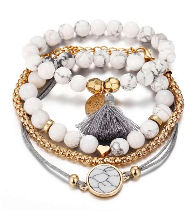 “4pcs tassel decor rhinestone bracelet set in white, gold, and grey”

“Stackable boho style rhinestone and tassel bracelet set for women”

“Multi-element layered bracelet set for daily wear and gifting”

“Elegant lightweight bohemian bracelets with rhinestones and tassels”