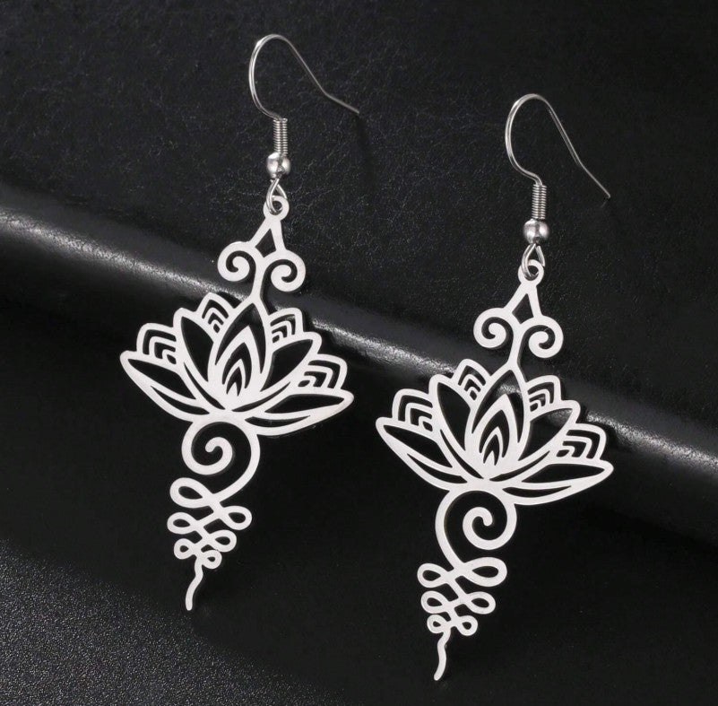“Lightweight stainless steel lotus flower earrings for women”

“Delicate and pretty lotus earrings symbolizing growth and peace”

“Minimalist spiritual lotus flower jewelry for everyday wear”

“Elegant stainless steel flower earrings for daily outfits and gifts”