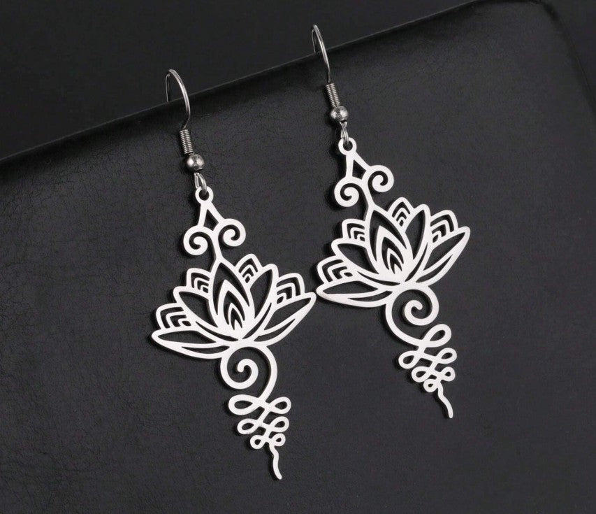 “Lightweight stainless steel lotus flower earrings for women”

“Delicate and pretty lotus earrings symbolizing growth and peace”

“Minimalist spiritual lotus flower jewelry for everyday wear”

“Elegant stainless steel flower earrings for daily outfits and gifts”