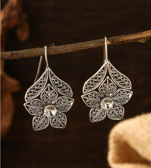 Vintage zinc alloy rhinestone flower earrings for women”

“Romantic floral rhinestone earrings symbolizing renewal and beauty”

“Elegant lightweight flower design earrings with vintage charm”

“Bohemian-inspired floral rhinestone earrings for gifting and daily wear”