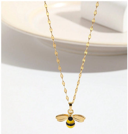 “Delicate gold bee pendant necklace for women, daily wear jewelry”

“Minimalist bee charm necklace from Christie Bella Bee Loved Collection”

“Adjustable gold-tone necklace with bee pendant”

“Nature-inspired dainty necklace with symbolic bee charm”