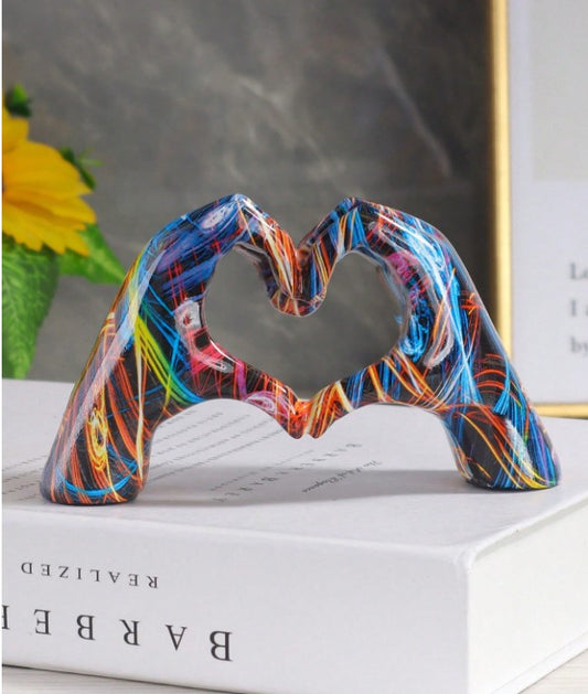 Colorful resin sculpture of two hands forming a heart”

“Rainbow hand heart decor symbolizing love and unity”

“Inspirational hand-shaped heart resin ornament for home or office”

“Vibrant unity sculpture gift for friends and loved ones”

