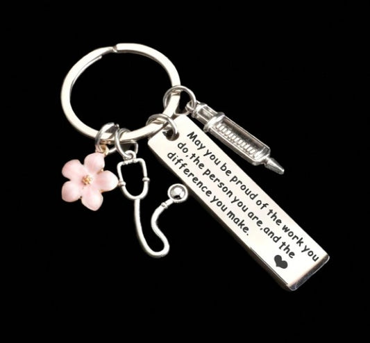 “Stainless steel inspirational nurse keychain with syringe and flower charms”

“Engraved nurse quote keychain for medical professionals”

“Inspirational gift keyring for nurse appreciation and graduation”

“Nurse charm keychain with medical and floral accents”

