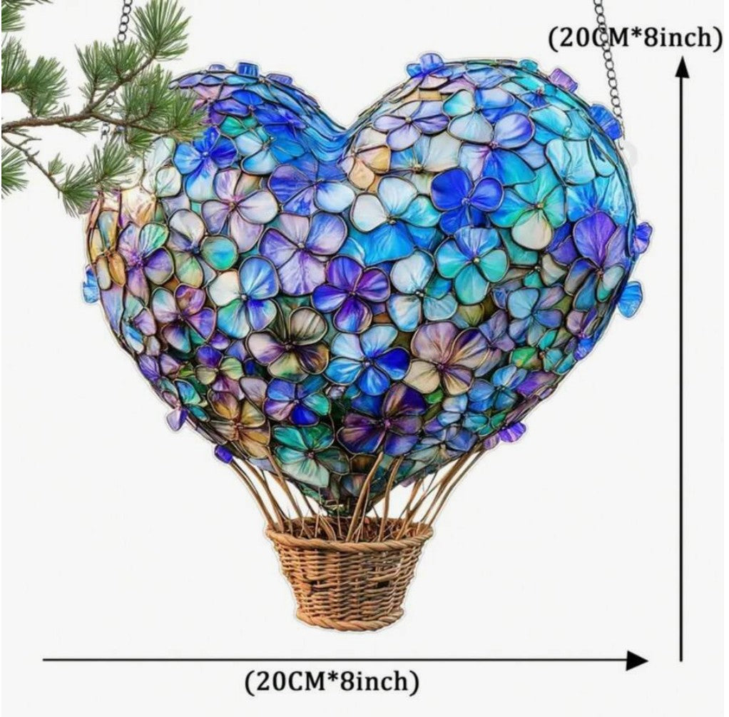 Whimsical heart and floral hot air balloon sun catcher hanging in window”

“8x8 inch light-catching home decor with heart and flower design”

“Hanging sun catcher with hot air balloon shape for boho and spiritual decor”