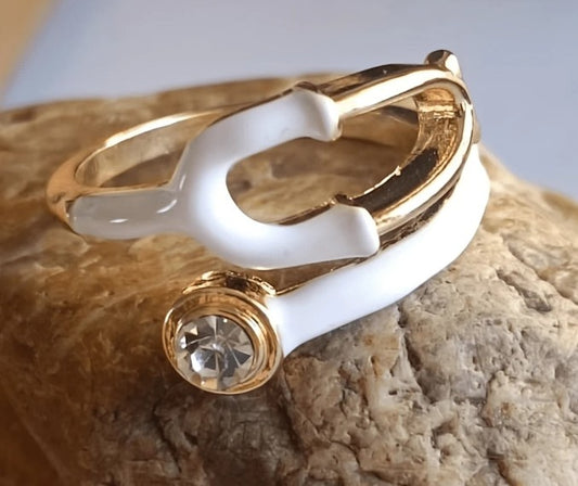 “Adjustable stethoscope-inspired fashion ring for nurses and doctors”

“Silver medical symbol ring for healthcare professionals”

“Heart & Soul Collection stethoscope jewelry piece”

