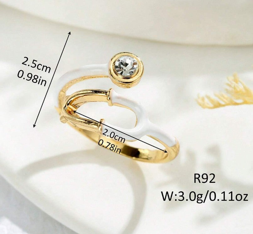 “Adjustable stethoscope-inspired fashion ring for nurses and doctors”

“Silver medical symbol ring for healthcare professionals”

“Heart & Soul Collection stethoscope jewelry piece”

