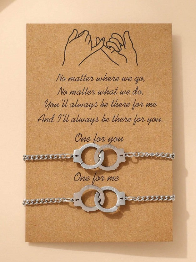 “Stainless steel handcuff couple bracelets with promise card”

“Matching handcuff charm bracelets for lovers or friends”

“Unique gift for couples or best friends with symbolic message”

