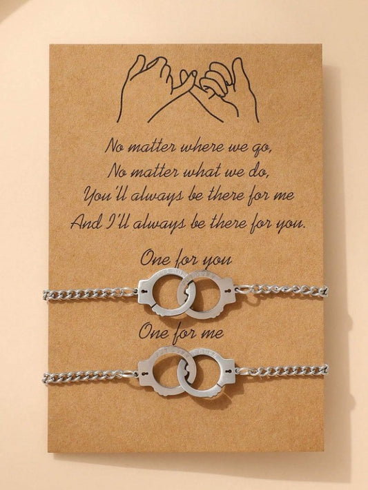 “Stainless steel handcuff couple bracelets with promise card”

“Matching handcuff charm bracelets for lovers or friends”

“Unique gift for couples or best friends with symbolic message”


