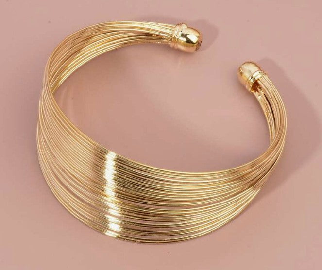“Minimalist gold spiritual cuff bracelet for women”

“Adjustable gold bangle with modern spiritual design”

“Golden energy cuff inspired by mindfulness and clarity”

“Elegant lightweight bracelet with spiritual symbolism”


