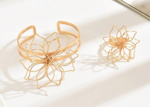 “Floral wire design bracelet and ring set for women”

“Lightweight boho floral jewelry set with openwork wire design”

“Nature-inspired blooming grace jewelry set, bracelet and ring”

“Creative European and American style floral wire jewelry set”
